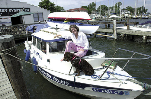 Susan and Kiwi on the boat, Landfall.